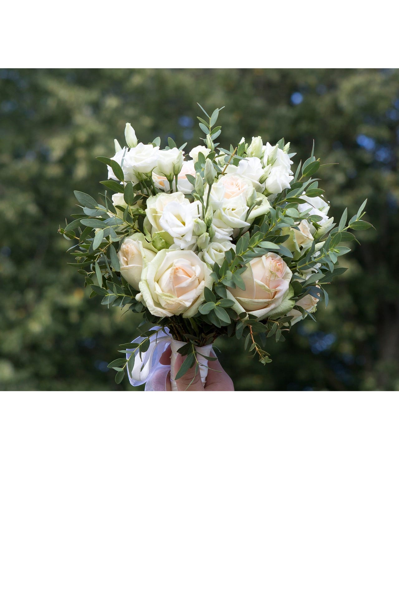 White and blush rose bouquet with eucalyptus greenery