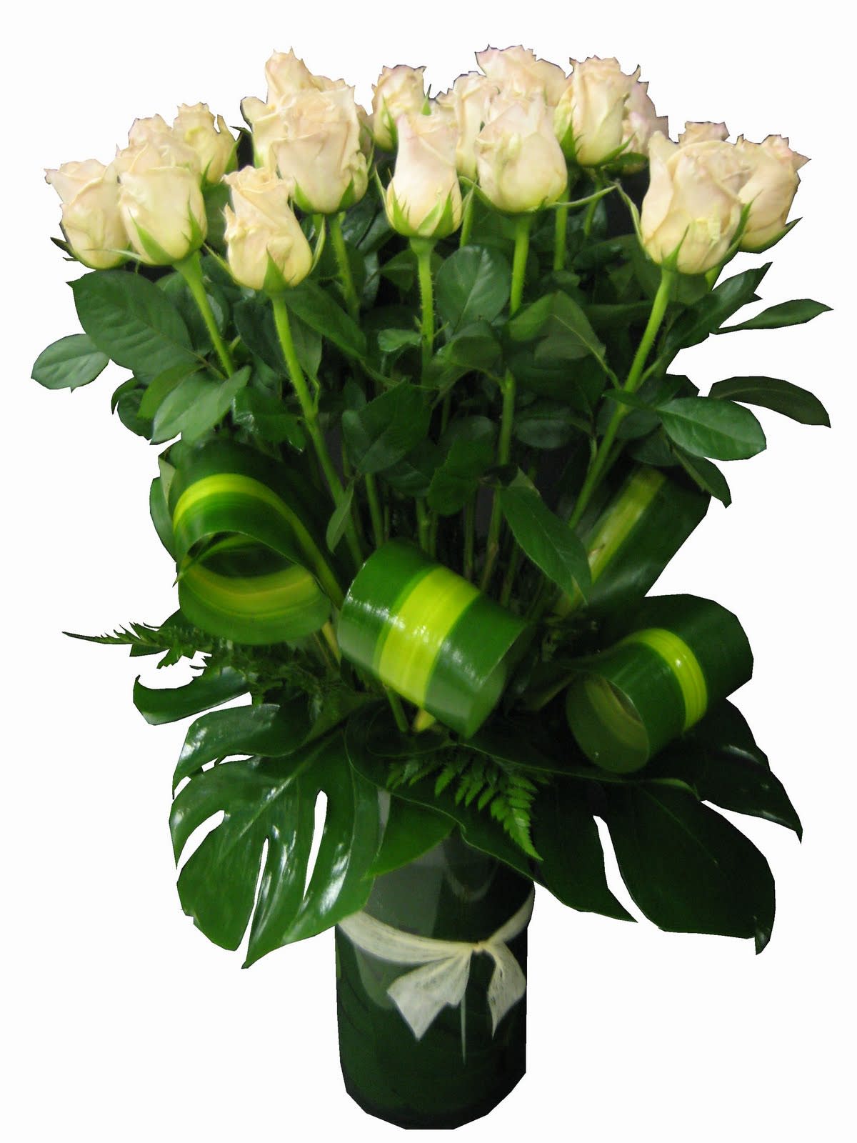 Bouquet of cream roses in a dark vase with green ribbon accents