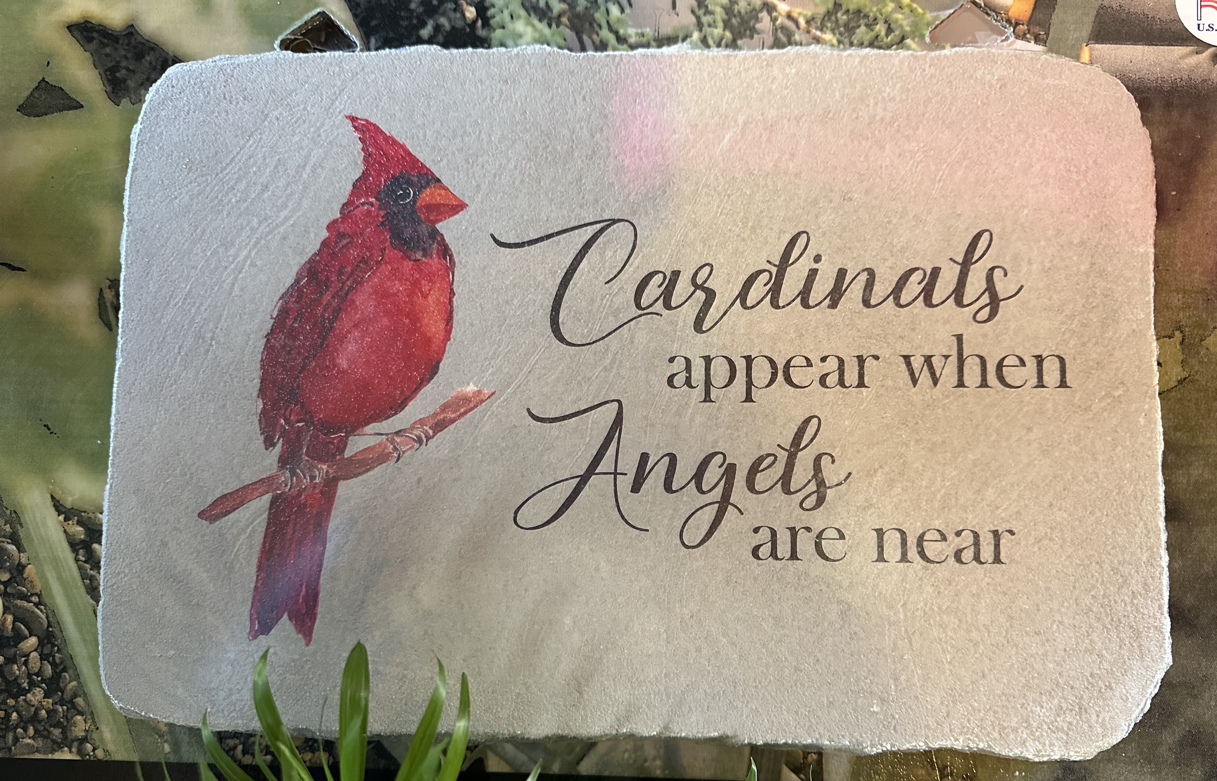 Decorative stone plaque with a cardinal and the words "Cardinals appear when Angels are near"
