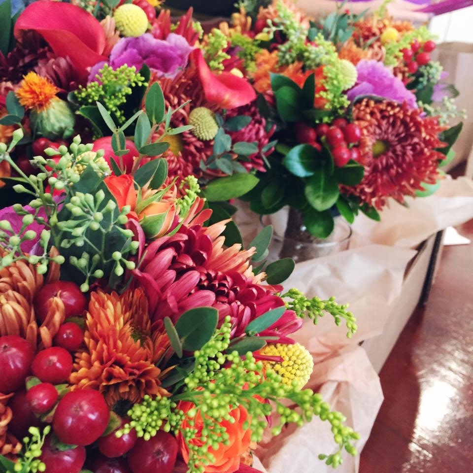 Colorful mixed flower bouquets with chrysanthemums and calla lilies