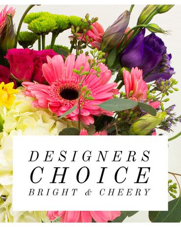 Designer Choice Best Value - This Designer Choice Best Value is a classic, romantic flower arrangement perfect as a Mother's Day gift or a thoughtful birthday bouquet. This Designer Choice Best Value arrangement is arranged in a low basket for an inviting, gift-ready presentation that reads feminine and fresh-the kind of mixed-flower bouquet that makes the person you're thinking of feel cherished and celebrated.  Perfect for Mother's Day, anniversaries, or to say "I'm thinking of you," this arrangement suits recipients who appreciate soft pastels and a polished, traditional look. Care is simple: keep blooms in a cool spot away from direct sun and refill the basket's water source as needed so the flowers stay fresh through the week.