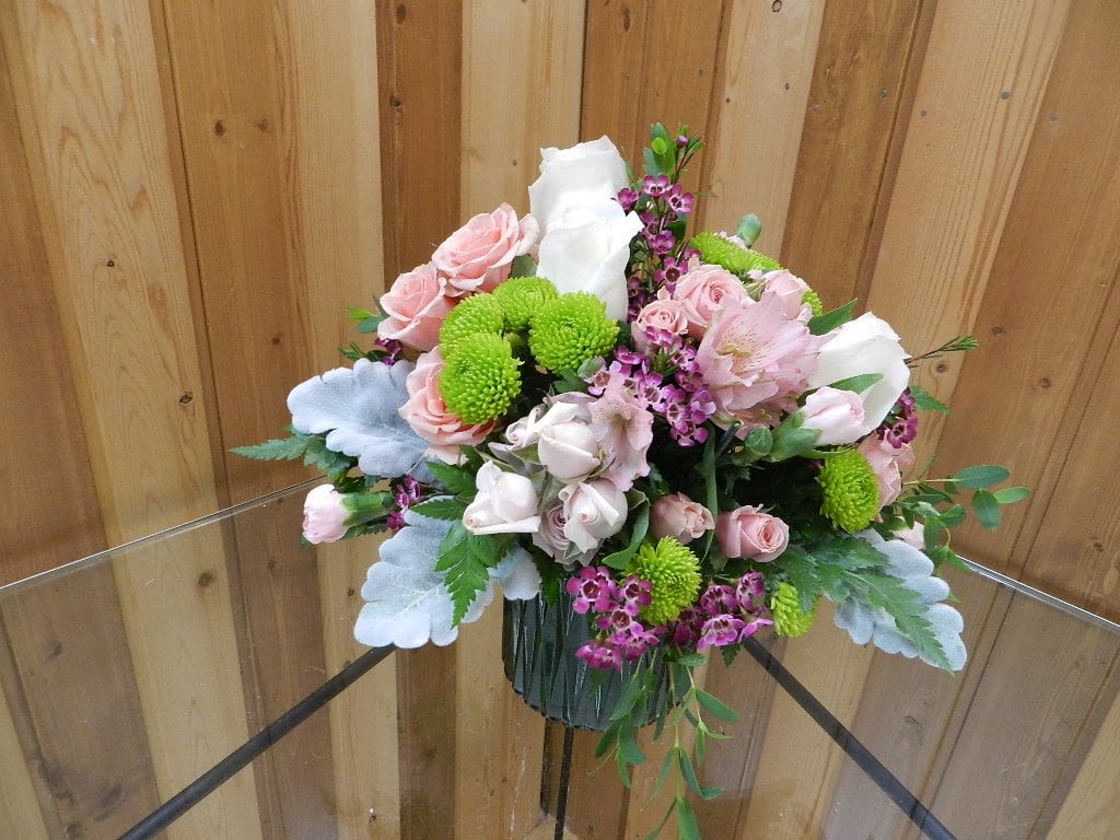 Bouquet of pink and white flowers in a glass vase