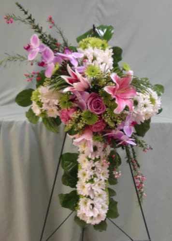 Standing floral spray with pink lilies, orchids, roses, and white daisies