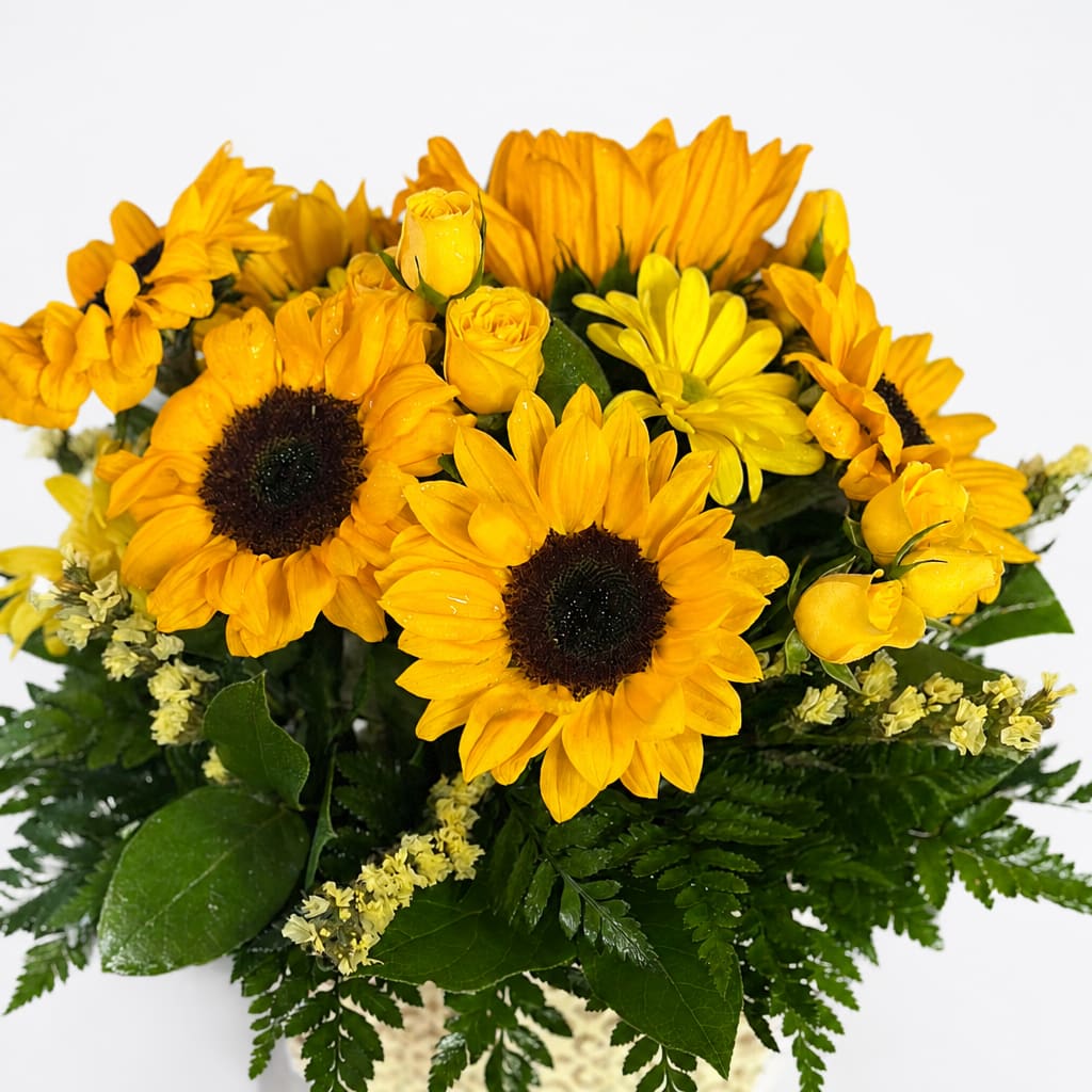 Yellow sunflower bouquet with small yellow roses and daisies