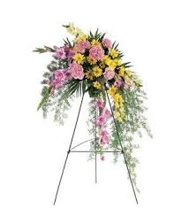 Pink and yellow floral spray on a standing easel