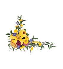 Yellow floral arrangement with purple accents and trailing greenery