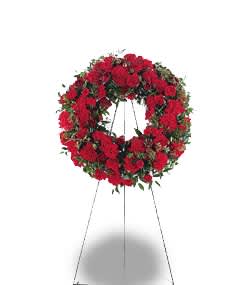 Red floral wreath on a standing easel