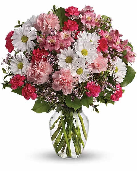 Pink and white mixed bouquet in a clear glass vase