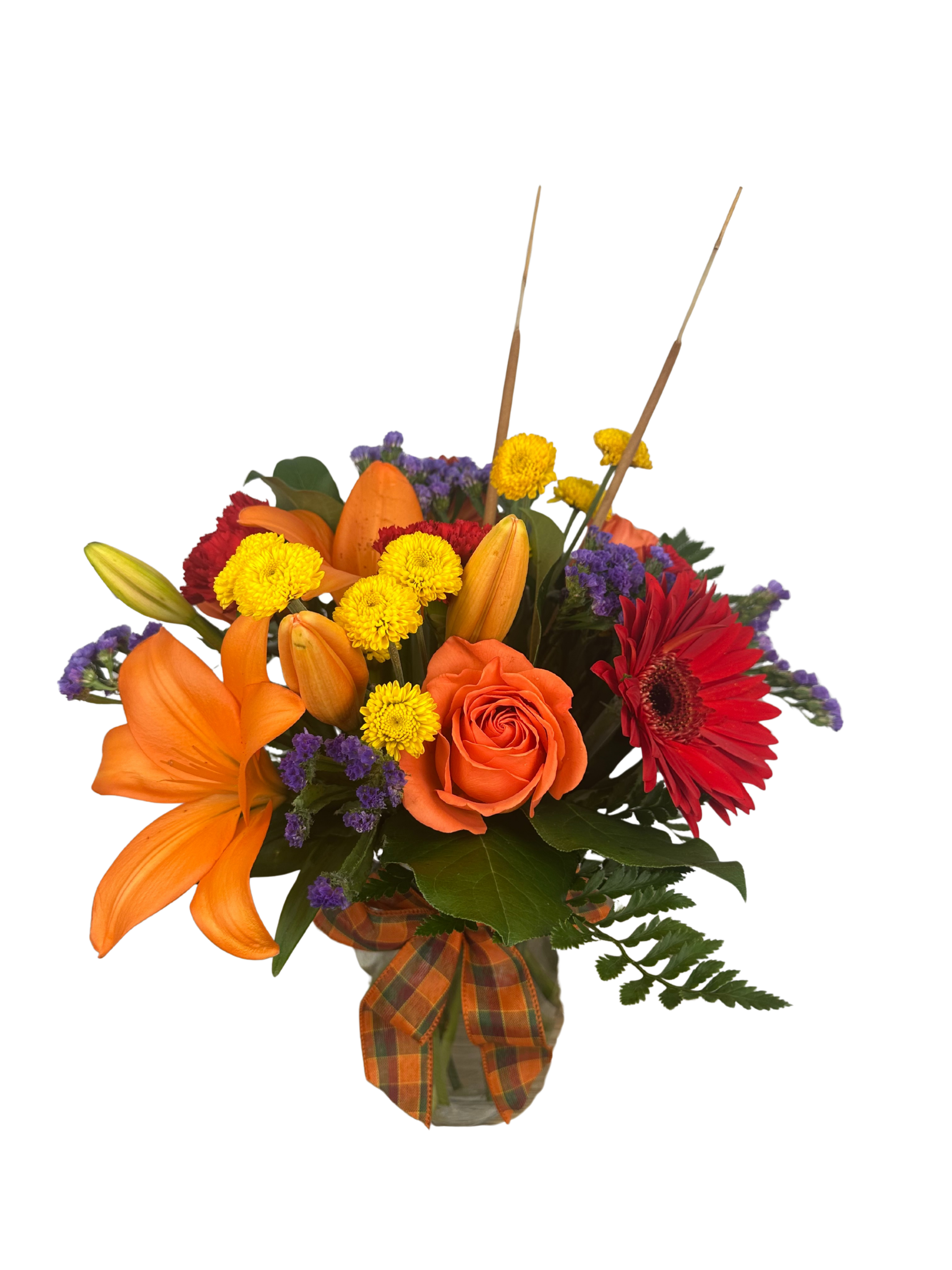 Apple of my Eye - Fall arrangement of lilies, carnations, roses, gerbera daisies, button poms and fall leaves