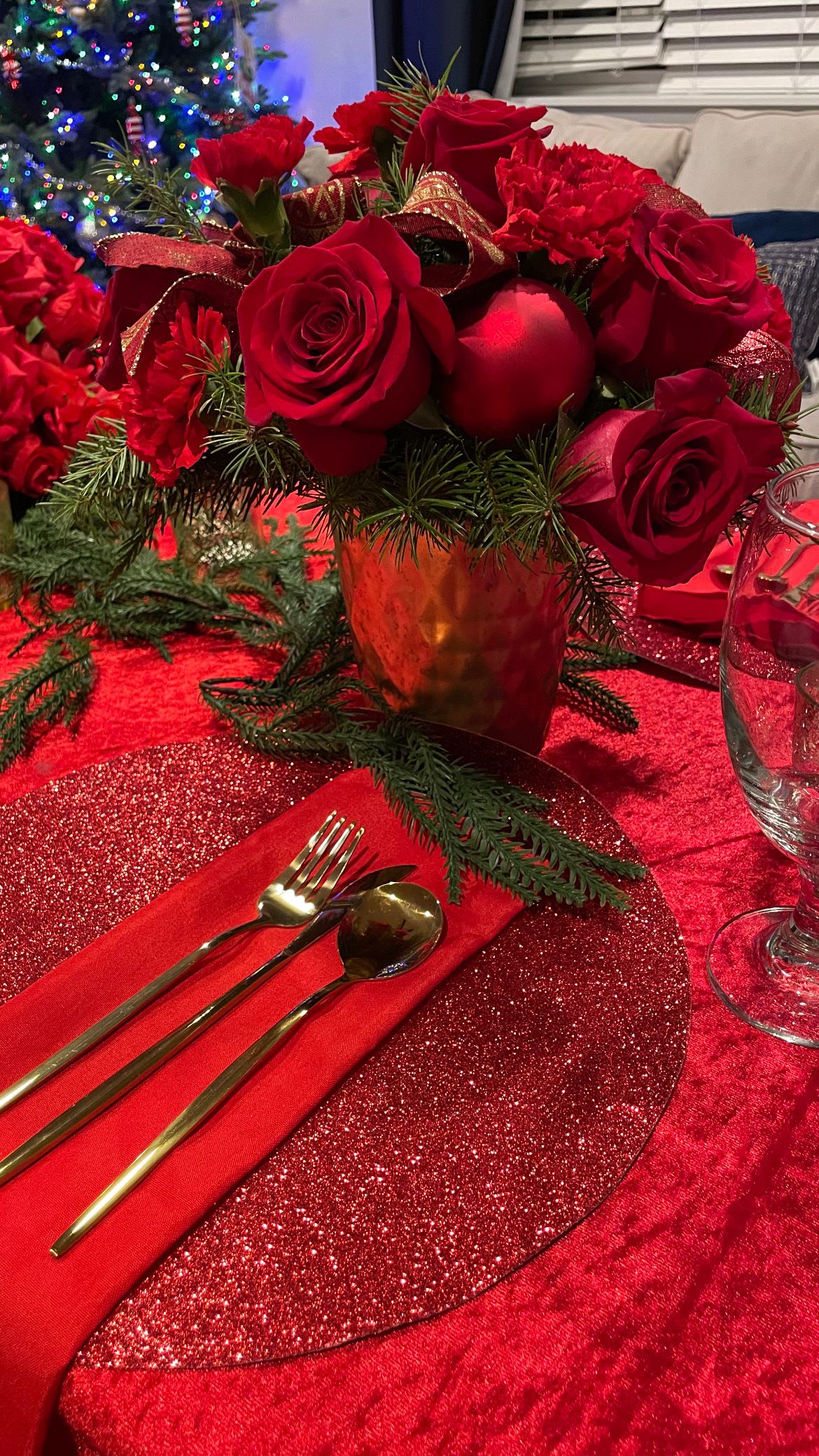 Christmas Whisper - A refined holiday floral arrangement by RMC Floral Designs, created to capture the serene beauty and warmth of the season. Featuring lush evergreens, elegant blooms, and festive accents, this design evokes the gentle magic of Christmas with timeless elegance.  Perfect as a centerpiece, gift, or decorative accent, Christmas Whisper brings a touch of sophistication and seasonal charm to any home or celebration.  Seattle florist specializing in custom holiday arrangements, luxury floral designs, and seasonal décor.