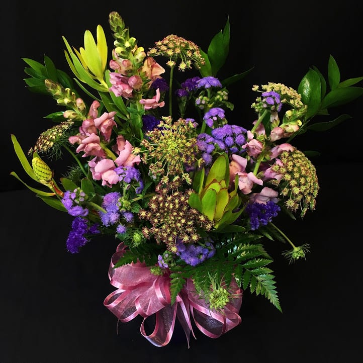Monotone mixed bouquet - Color will vary - Choose any one natural flower color. This bouquet must be ordered at least one week and advance. Shades of  your color choice will be combined with greenery and various  textured flowers. Elegant and perfect complement to a high style home or office.