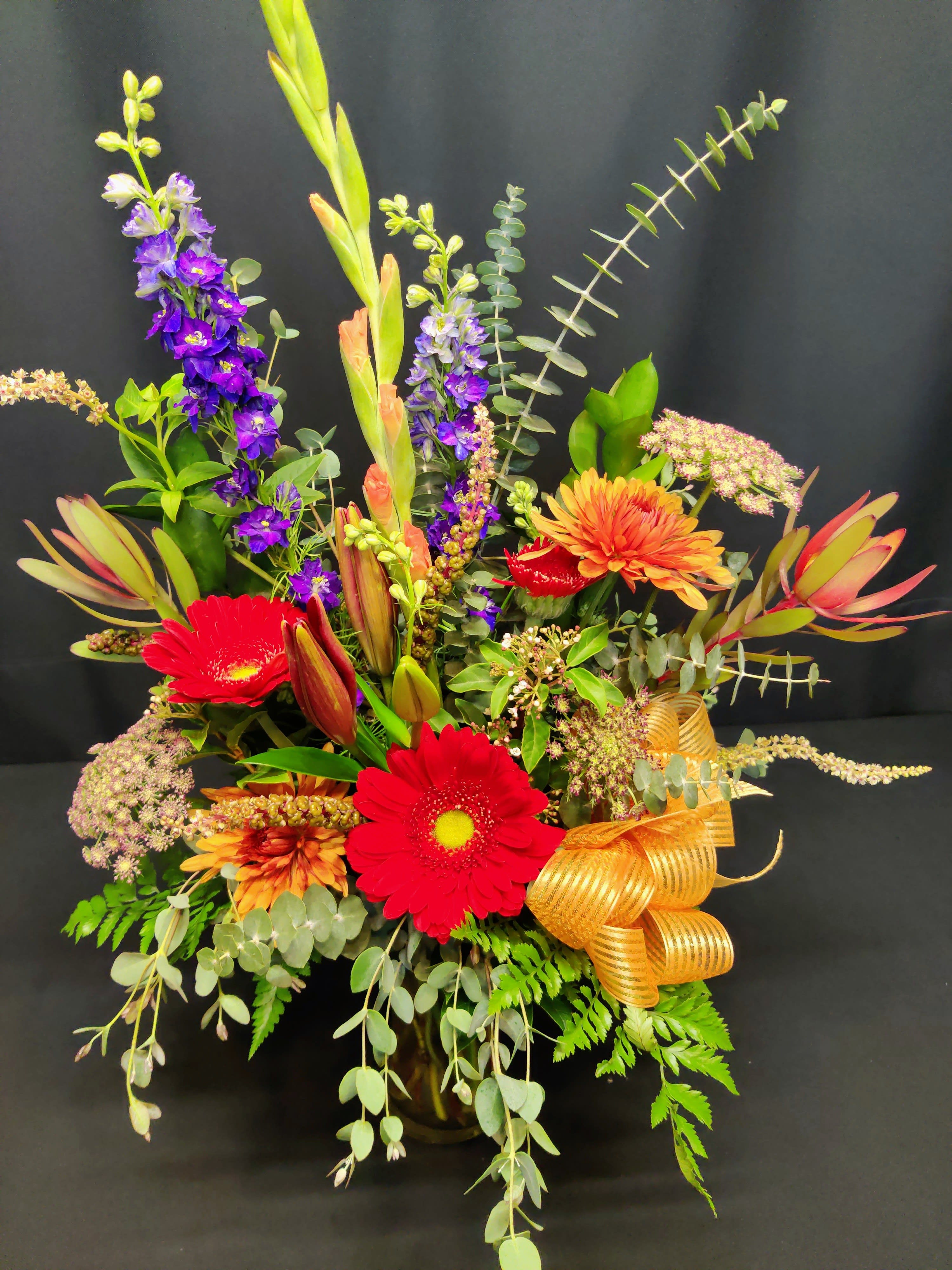 Bustling Fall - Gorgeous medium size bouquet of fall colors and textures.  Actual flowers and colors will vary.