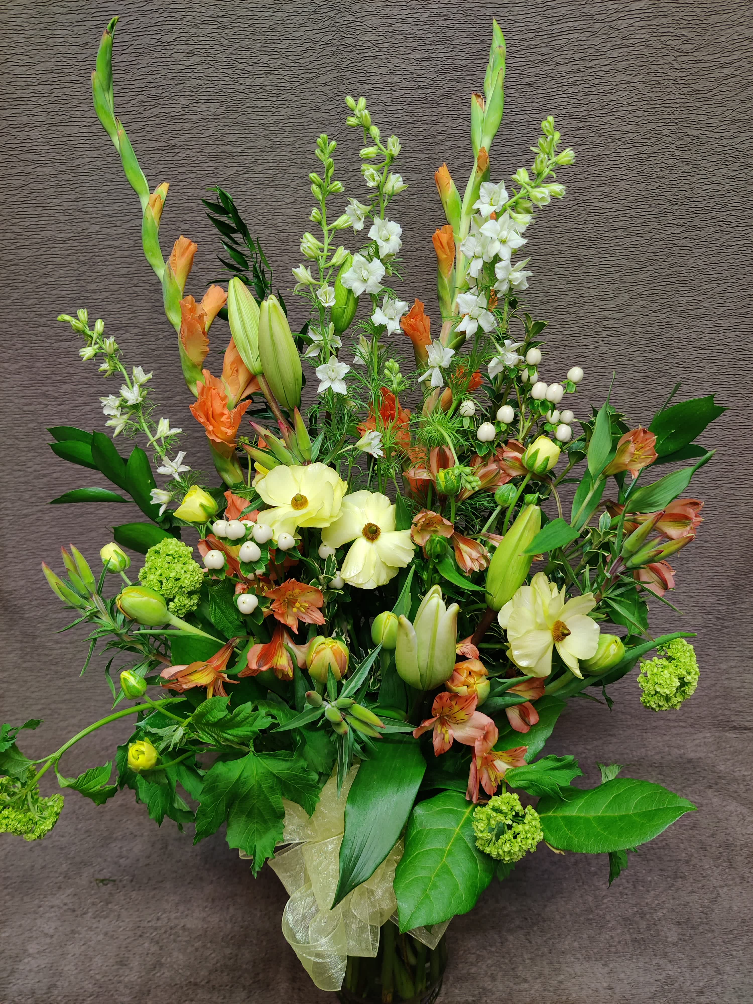 Butterfly ranunculus large bouquet - Soft palette and some springy seasonal flowers with a few highly prized butterfly ranunculus and tulips. Colors and varieties may vary.