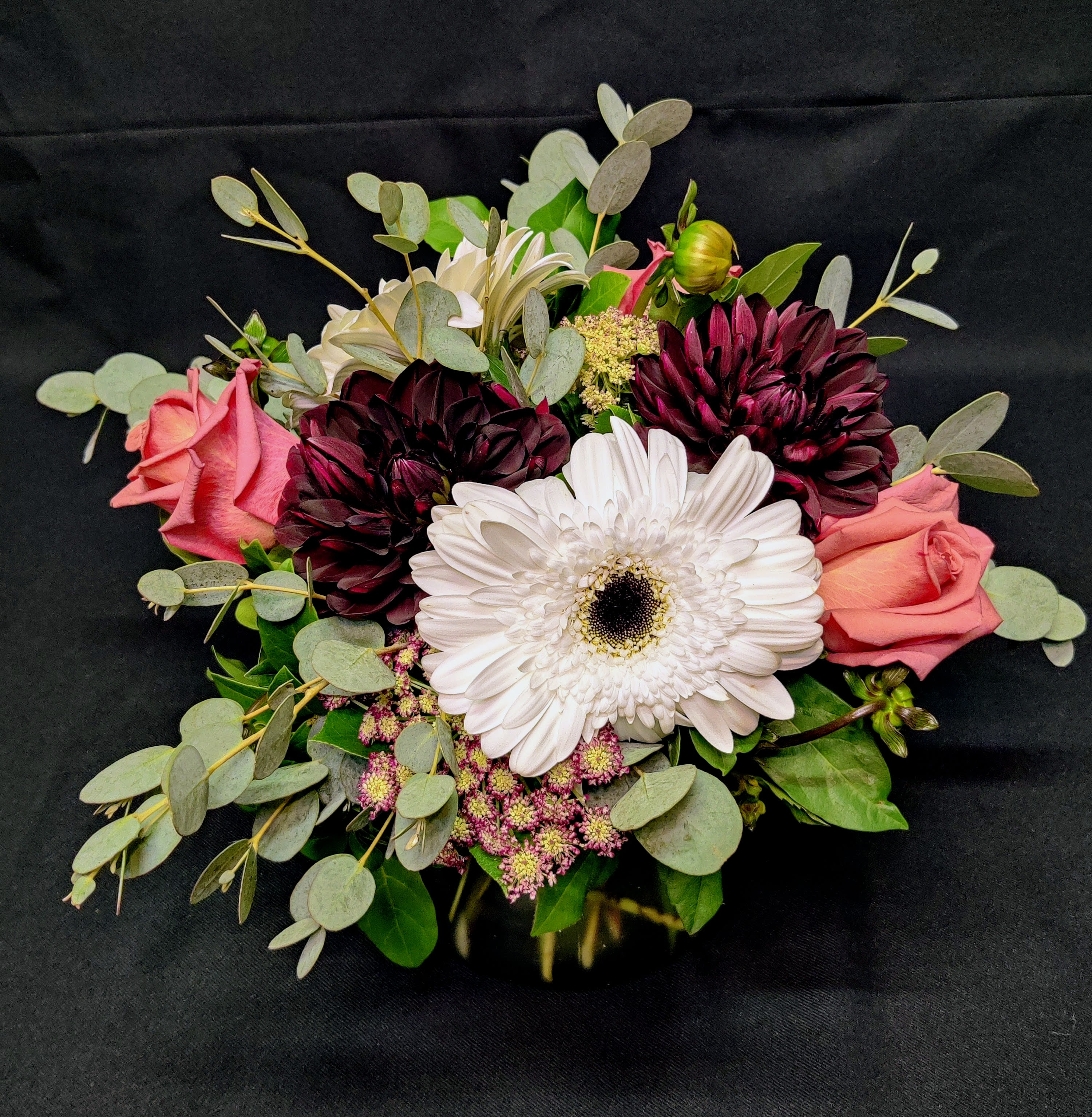 Small Rose Centerpiece - Perfect for an anniversary. Round centerpiece posey of flowers including roses and premium flowers. Colors and flowers will vary.  Petite size for a 60" dining table event centerpiece.