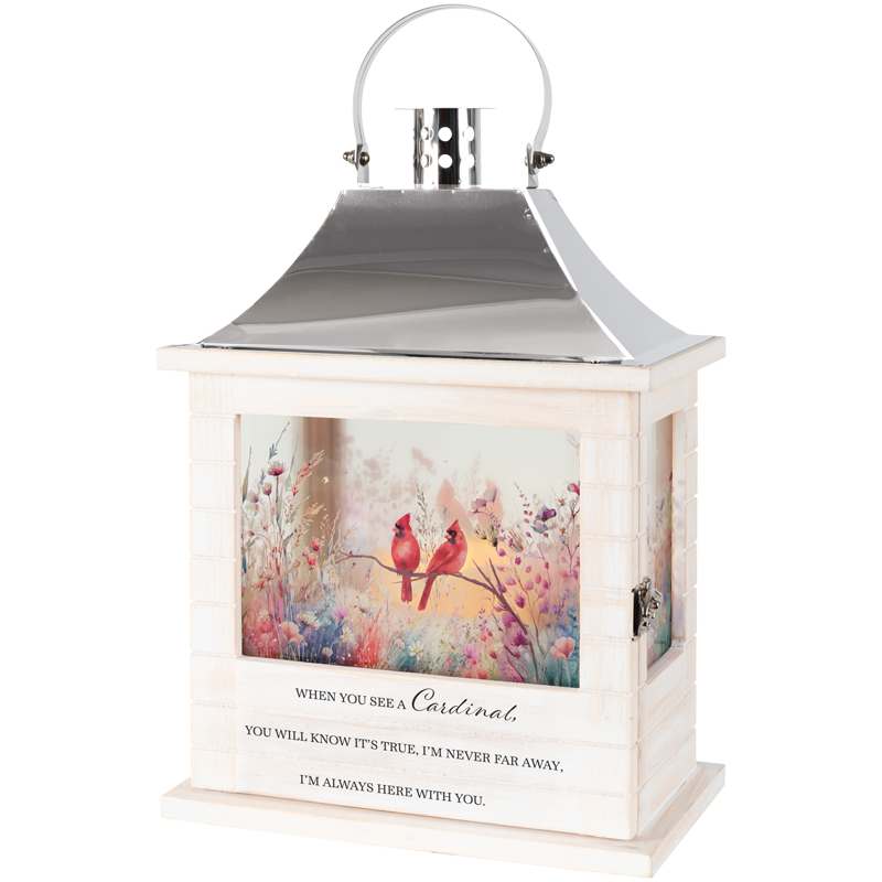 Decorative lantern with cardinal artwork and a memorial quote