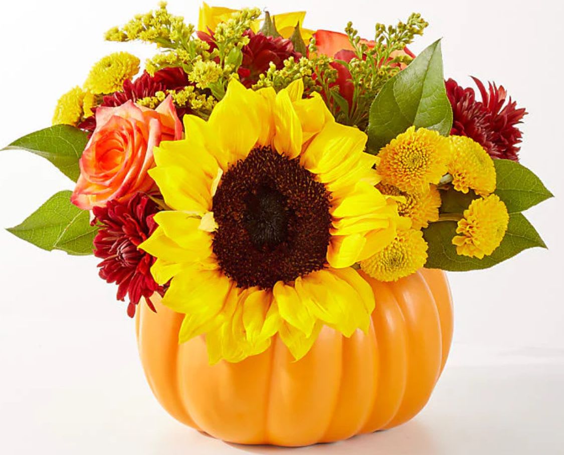GOLDEN GOURD PUMPKIN BOUQUET By FTD - No need to go to the pumpkin patch this year with this gorgeous arrangement of seasonal stems, artfully arranged in a pumpkin vase to deliver some happiness.  The Standard Bouquet is approximately 9"H x 10"W. The Deluxe Bouquet is approximately 10"H x 11"W. The Premium Bouquet is approximately 10"H x 12"W.  BLOOM DETAILS Rose Sunflower Solidago Poms