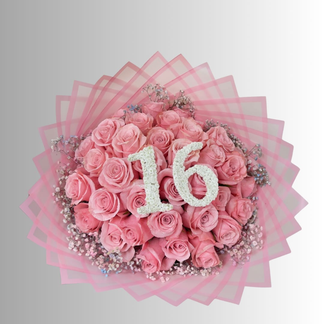 Pink rose bouquet with a white floral "16" topper