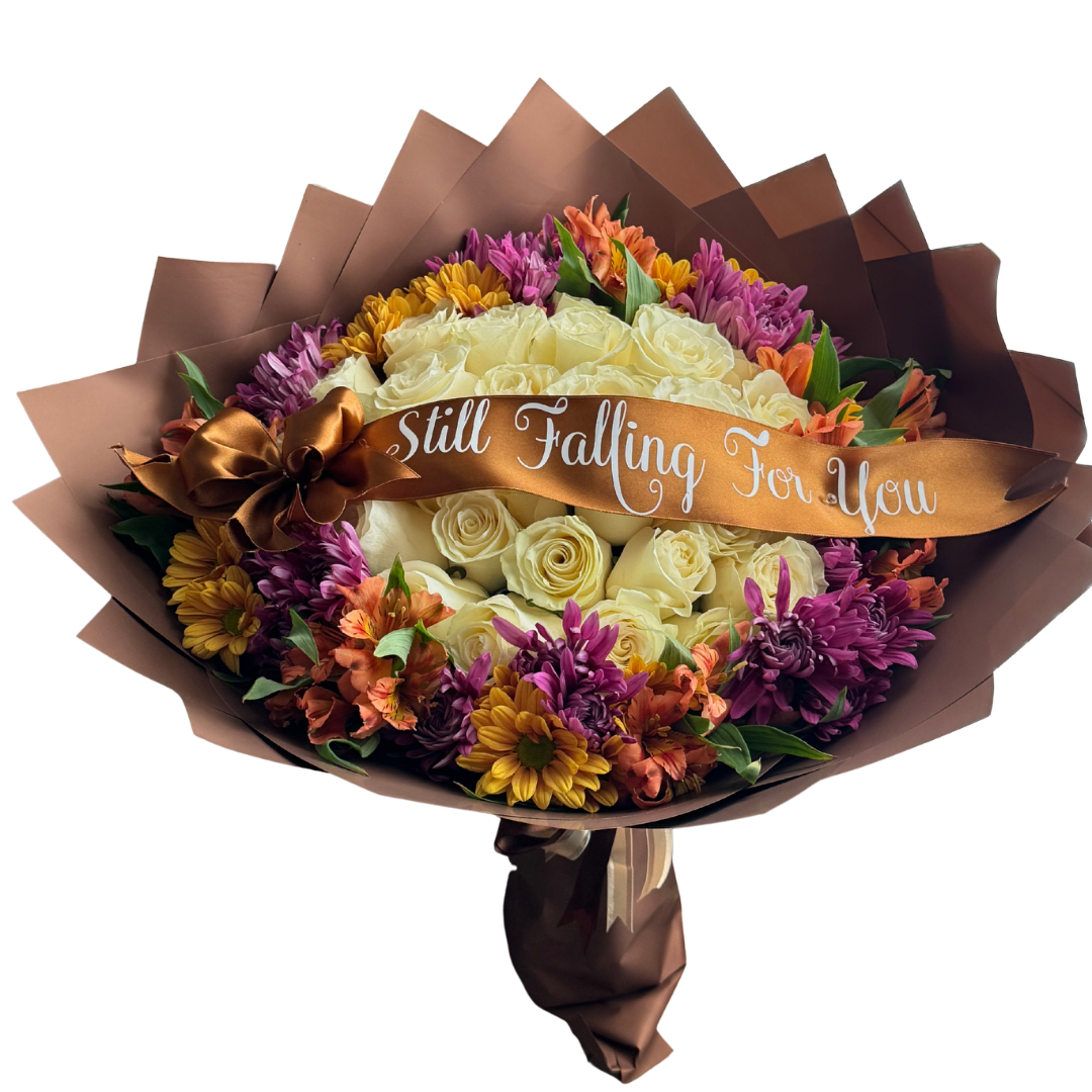 Bouquet of cream roses with purple and orange flowers wrapped in brown paper