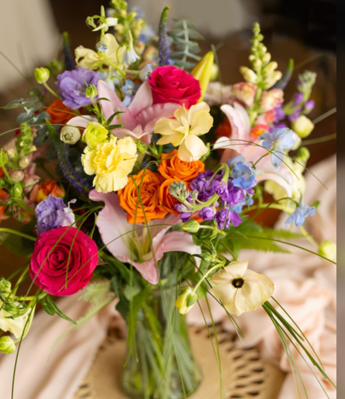 Pollen Party - OUR CHOICE - COLORFUL BRIGHTS - Turn up the color and let the blooms do the celebrating. Pollen Party is a lively mix of fresh seasonal flowers bursting with personality—playful petals, vibrant textures, and just the right amount of wild garden charm. Designed to feel like nature threw a celebration, this arrangement is full, fragrant, and impossible to ignore.  Perfect for birthdays, thank-yous, or just because, Pollen Party brings joyful energy to any room. Expect a cheerful mix of blooms dancing together in bright harmony—