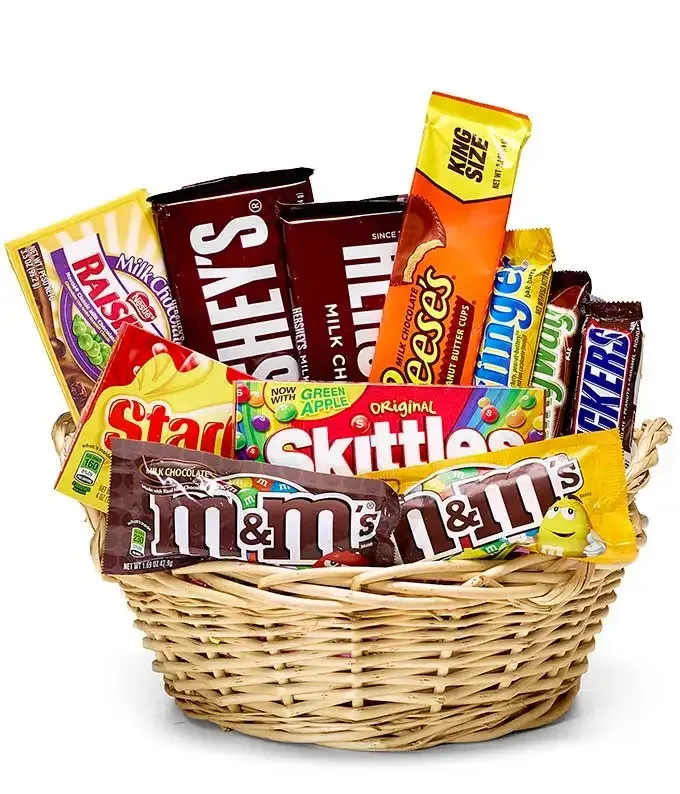 Basket filled with assorted candy bars and sweets
