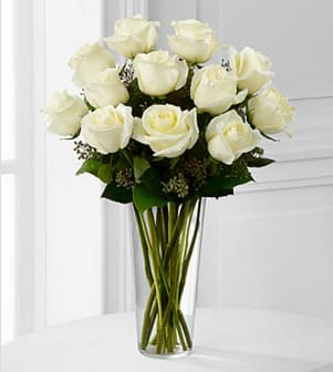 The White Rose Bouquet  - The beauty of white roses is unchallenged. Representing innocence, their versatility makes them a favorite gift to offer congratulations for graduation, engagements, bridal showers, new baby, or even a gift of sympathy. GOOD bouquet is approximately 19"H x 15". Your purchase includes a complimentary personalized gift message.