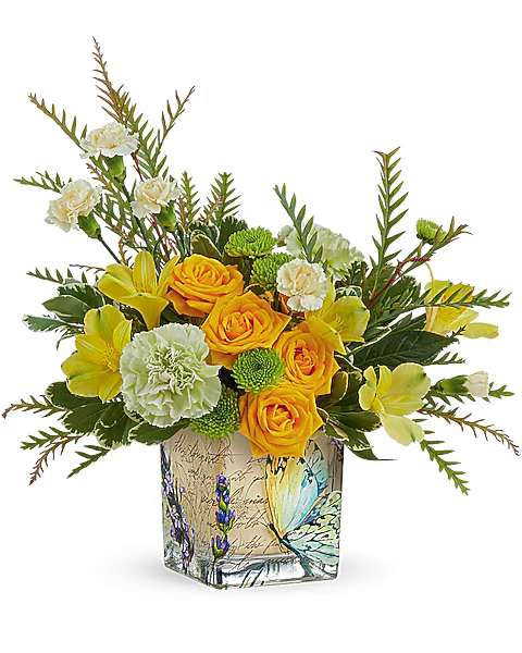 Yellow roses and carnations in a butterfly-printed glass vase