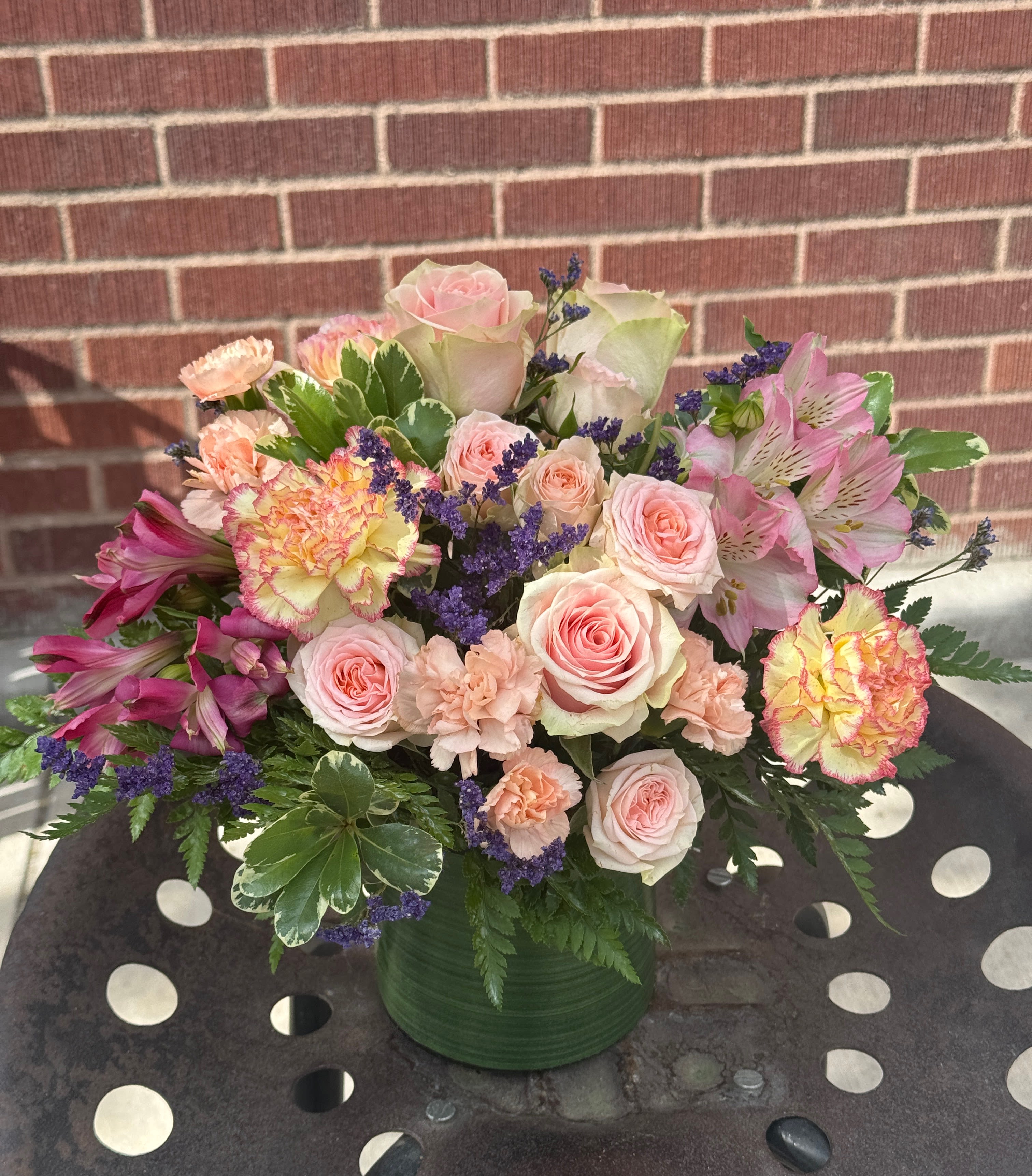 Delicate Thoughts - Designed by the owner of the shop, this soft arrangement  features pink, lavendar and peach blooms. Shades may vary slightly, but will stay with the color scheme. :)