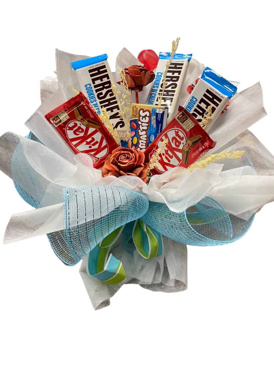 Candy bouquet with Hershey's, KitKat, and Smarties wrapped in blue and white mesh