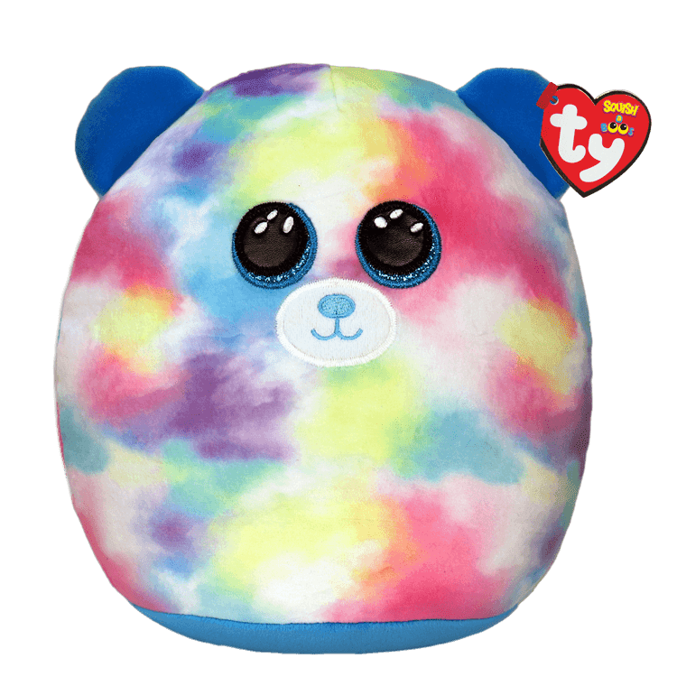 Rainbow tie-dye plush bear with blue ears and a heart tag