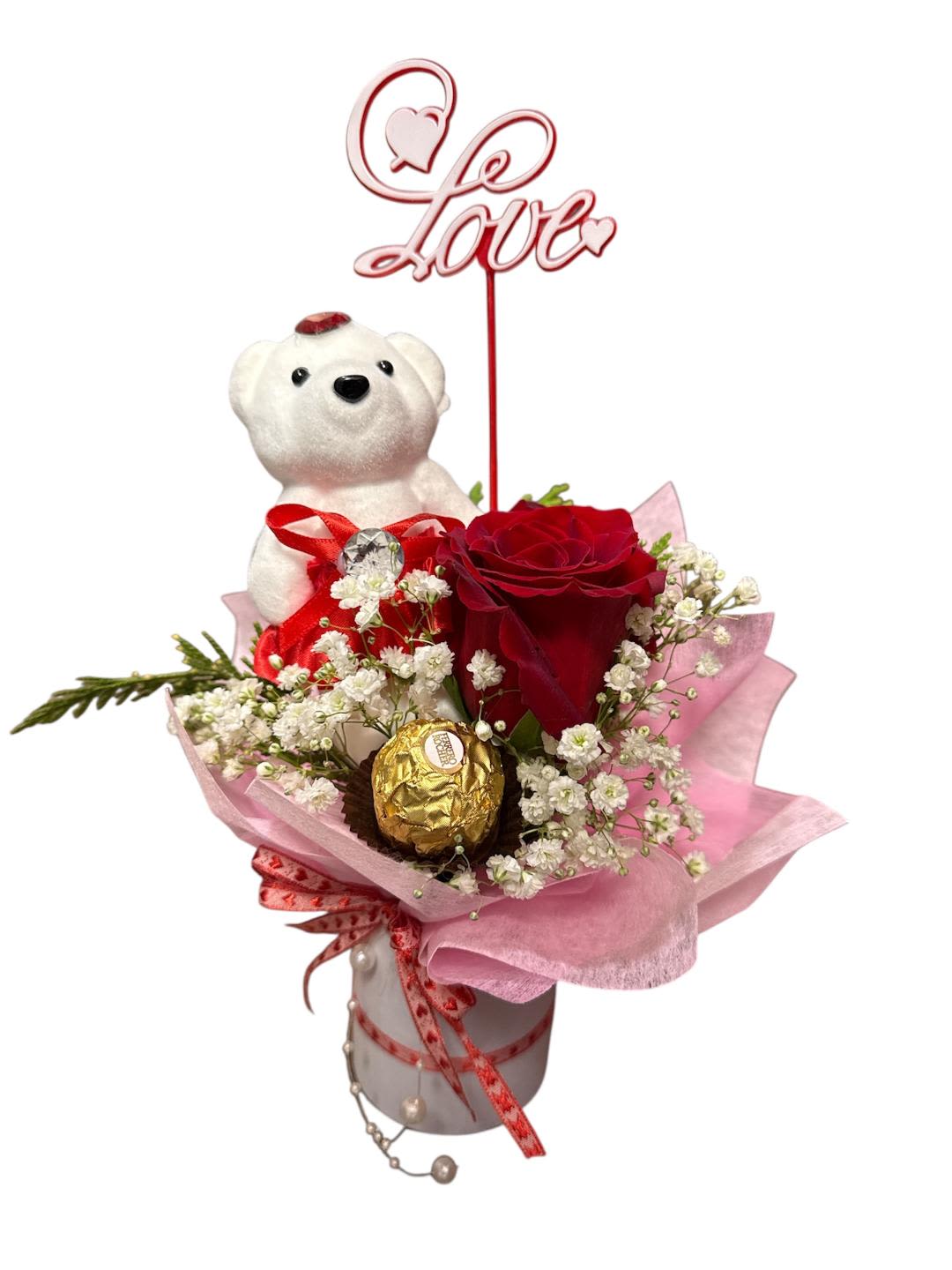 Red rose bouquet with a teddy bear, chocolates, and a love topper
