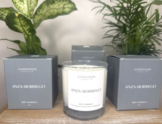 Soy candle in a glass jar with two matching boxes