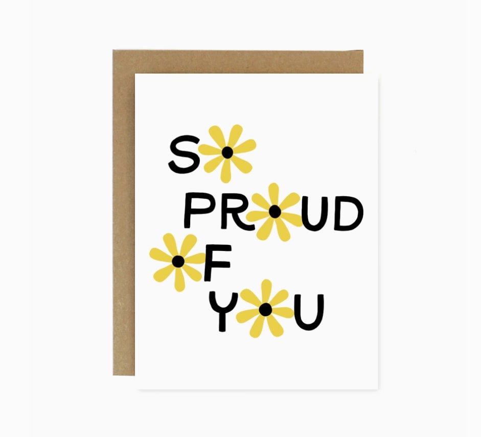Greeting card with "So Proud of You" text and yellow flower graphics