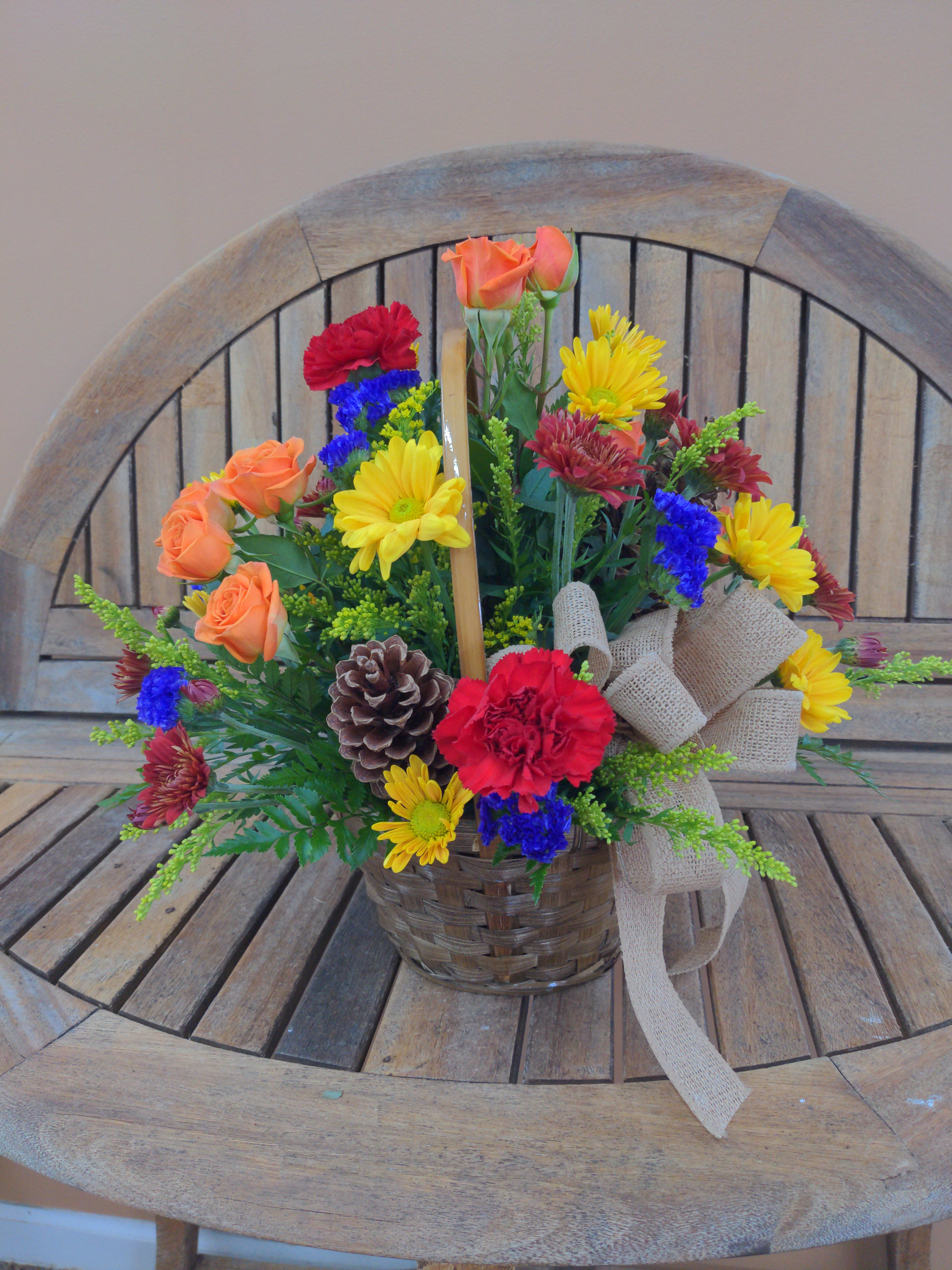 Fall Basket - Mixed fall flowers in basket.