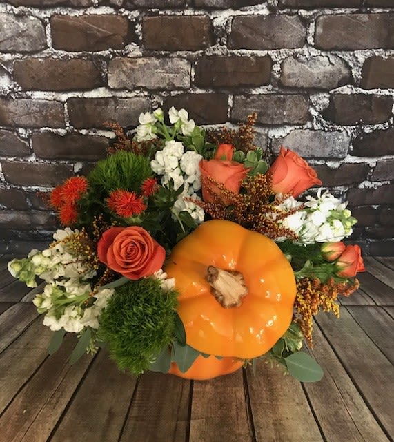 Pumpkin Spice - An orange ceramic pumpkin with lid filled with festive fall colors.  A great gift for anyone! Approx. 12" W x 12" H