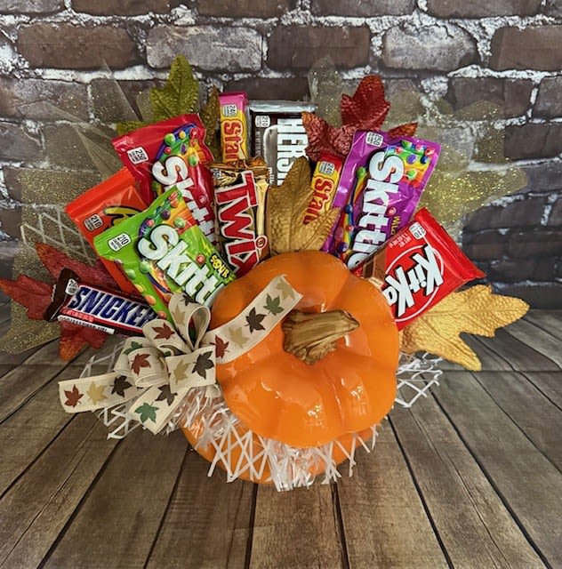 "Fall" My Favorite Treats - A cute Fall take on our candy bouquet..... bigger and better and in a cute pumpkin container! 