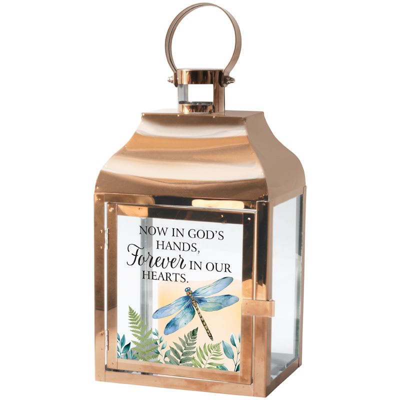 "In our Hearts" Lantern - These lanterns are made with a high quality metal finish and UV printed glass artwork with sentiment. The flameless LED candle features a built in automatic timer; 6 hours ON/18 hours OFF. 3AAA batteries included. These lanterns are intended for indoor use only.  W: 6" H: 12 1/4" D: 4 1/2"