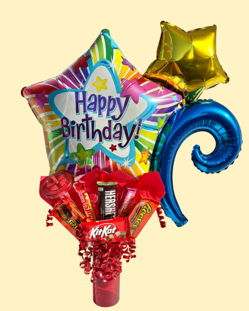 Sweet Celebration Candy Tumbler - The Perfect Birthday Treat!   Make birthdays extra fun with this festive candy-filled tumbler! Each reusable cup comes packed with a delicious mix of favorites—Hershey’s, Reese’s, Kit Kat, and Starburst—creating a colorful, irresistible surprise for any candy lover.  Topped off with bright birthday balloons, this gift is ready to celebrate the moment it arrives. It’s the perfect choice for party favors, coworker gifts, kids’ birthdays, or anyone who deserves a sweet pick‑me‑up.  What’s Inside:  Reusable tumbler cup  Hershey’s chocolates  Reese’s peanut butter treats  Kit Kat bars  Starburst candies  Festive birthday balloons  A fun, cheerful, and delicious gift that brings smiles instantly. Great for all ages and all celebrations!