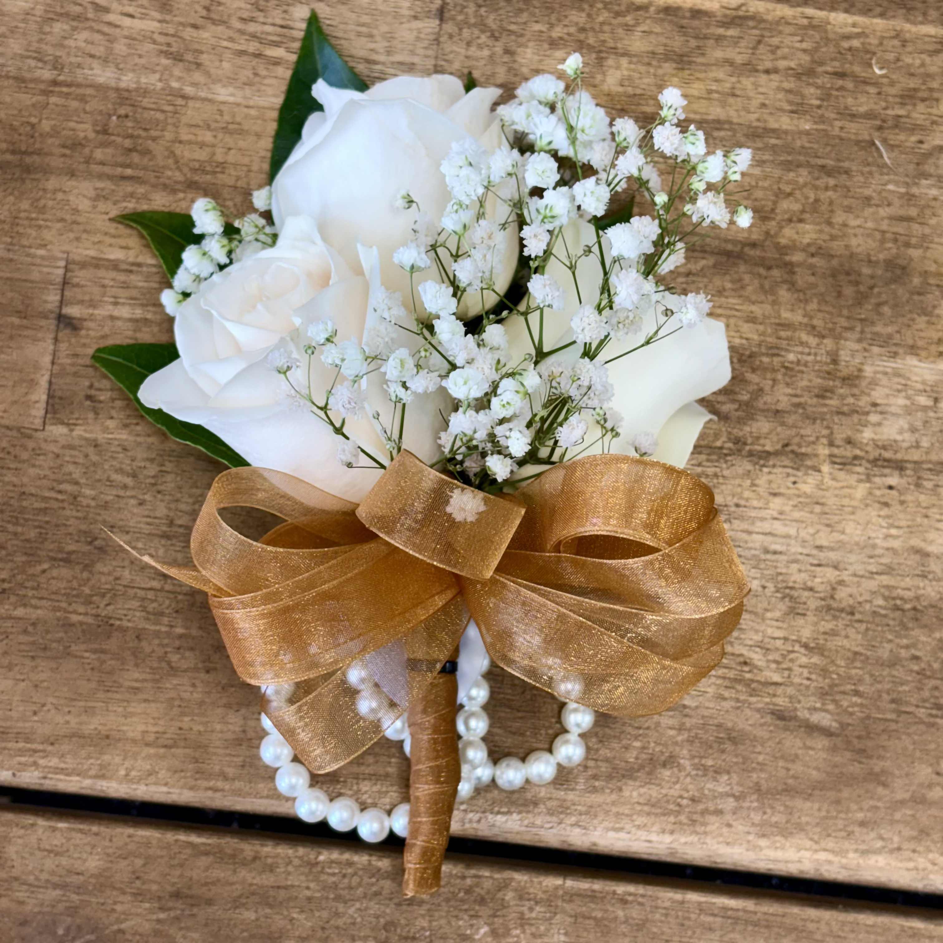 Classic Rose Corsage - Elegant wrist corsages handcrafted with premium roses and lush foliage. Ideal for proms, weddings, and formal occasions. Choose your rose color and ribbon to perfectly match your look.  To personalize your corsage, simply include your preferred flower type, color, and ribbon choice in the "Special Notes" section at checkout. We’ll create a custom piece made just for you.