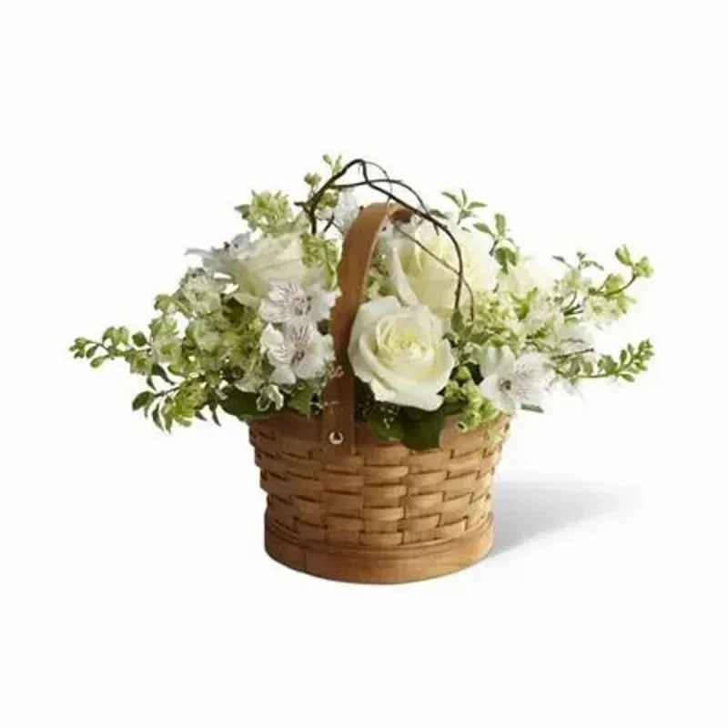 FTD Peaceful Garden™ Basket - Roses, larkspur and Peruvian lilies are accented with curly willow tips and an assortment of lush greens. The bouquet is artfully arranged in a natural round woodchip basket, creating the perfect way to convey your wishes for peace and tranquility during this time of loss and sadness. 