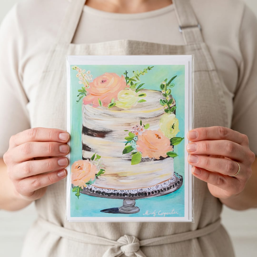 Greeting card with a painted tiered cake and flowers