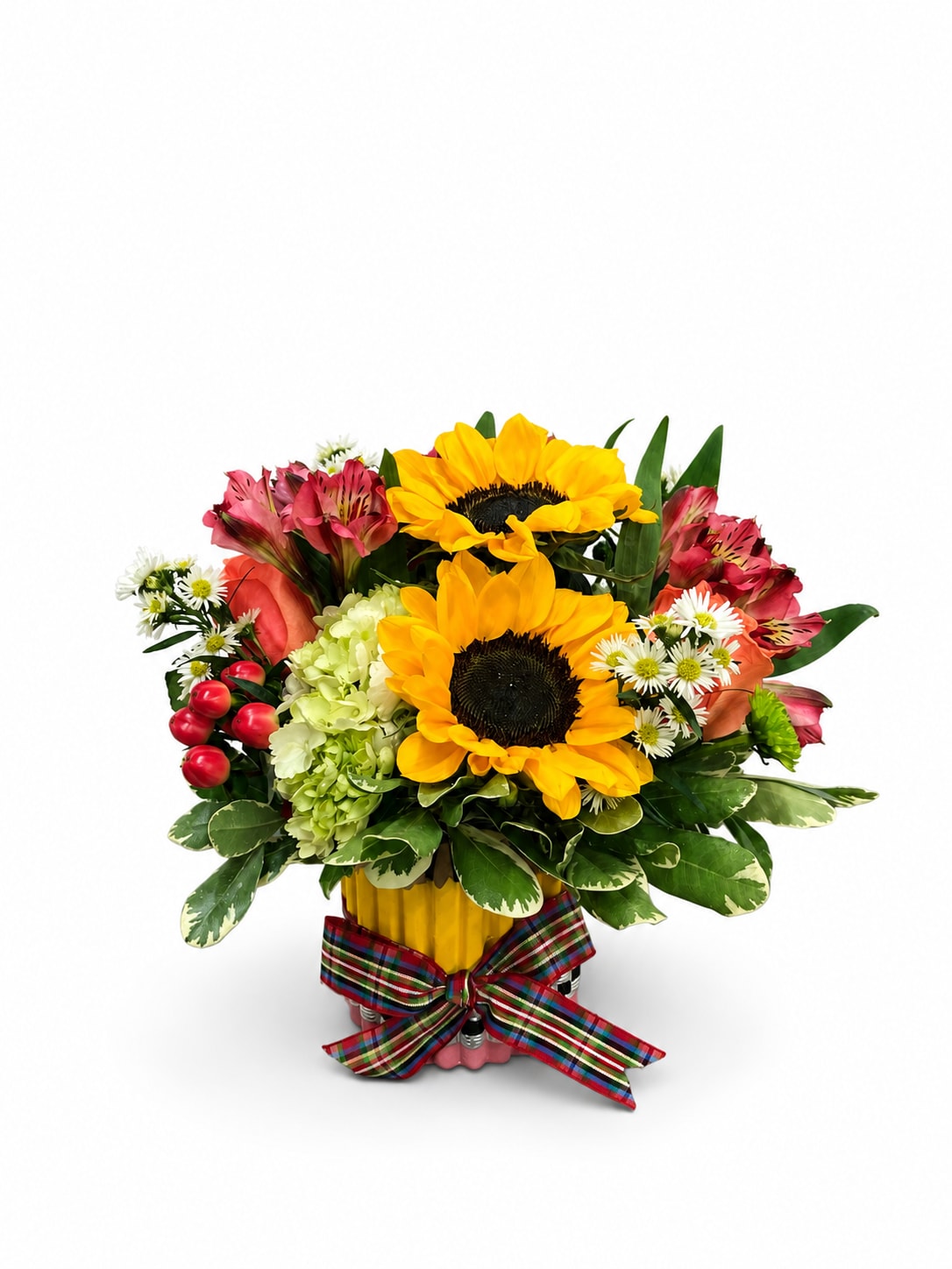 Bouquet of sunflowers, pink alstroemeria, and white daisies in a yellow container