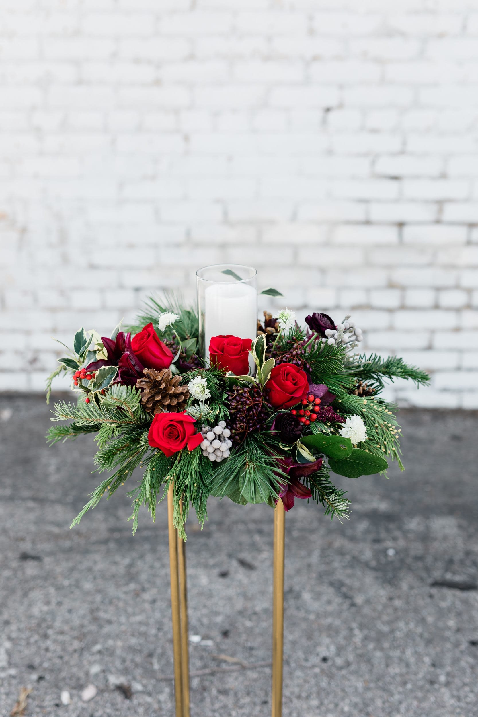 Christmas Dinner Centerpiece - Wow your guests this season with this traditional yet one-of-a-kind floral centerpiece for this year's festivities! Glass shield and candle NOT included.  pictured [DELUXE]