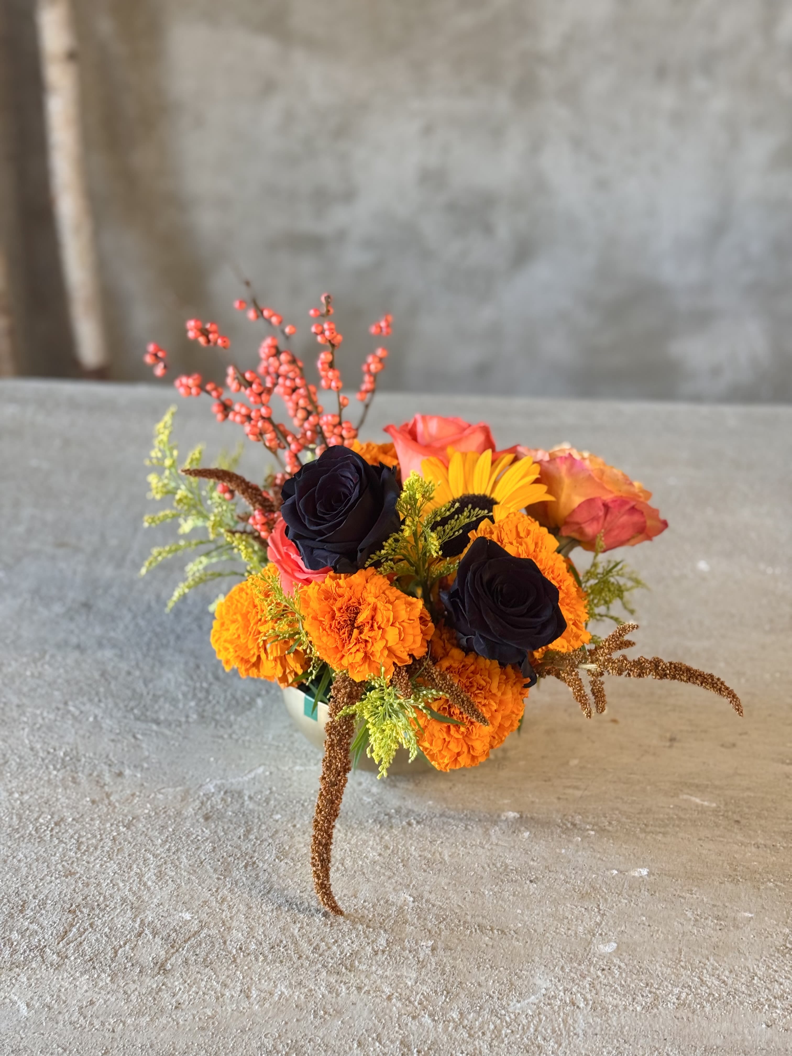 Floral Be-Witching - This stunning holiday arrangement is made up of holiday black roses, whites, burgundies, and other macabre textures!   pictured : [DELUXE]