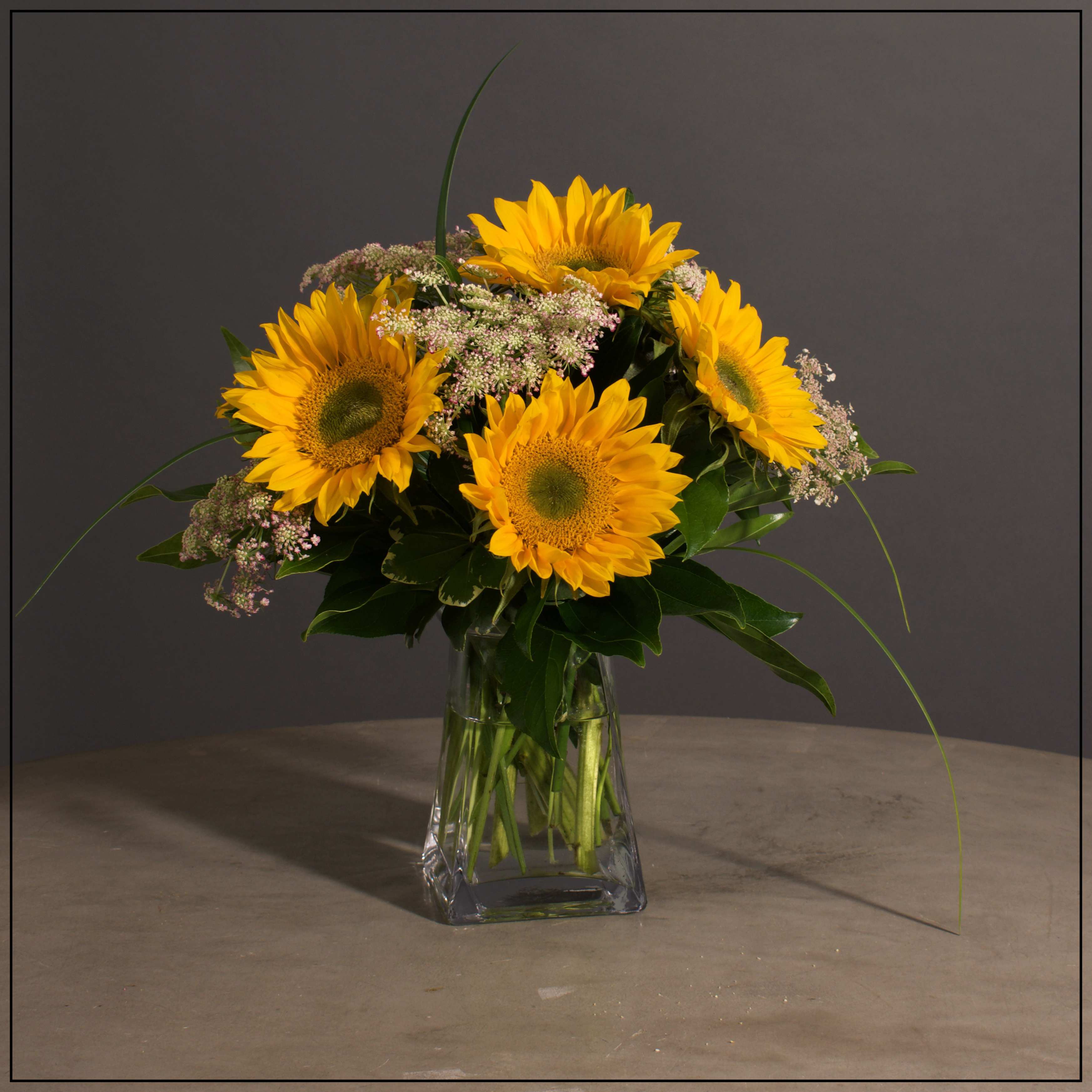 Sunflower bouquet in a clear glass vase