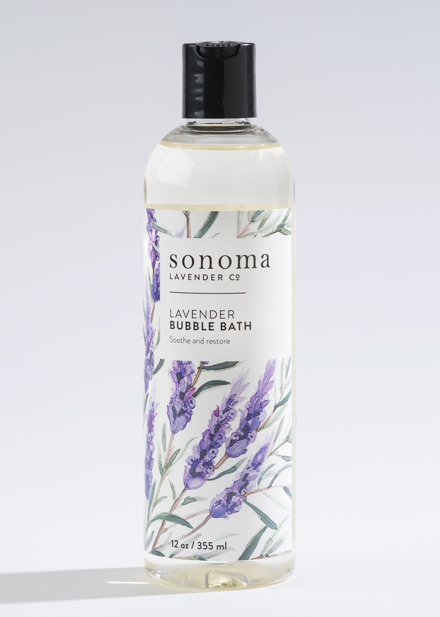 Bottle of lavender bubble bath with illustrated purple lavender sprigs on the label