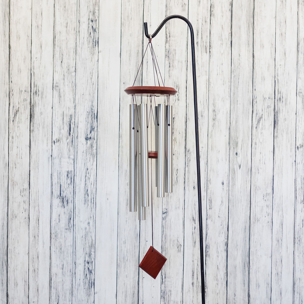 Peaceful - Musically tuned for a beautiful melody, a Woodstock windchime is a lasting reminder of how much you care. *For sympathy services at Olson Funeral Home  in Menomonie, a complimentary display stand is provided.  For all other deliveries, the chime is presented in a box.  Upgrade to Deluxe and a stand is included.*  Approximate Dimensions: 27" H x 8" W