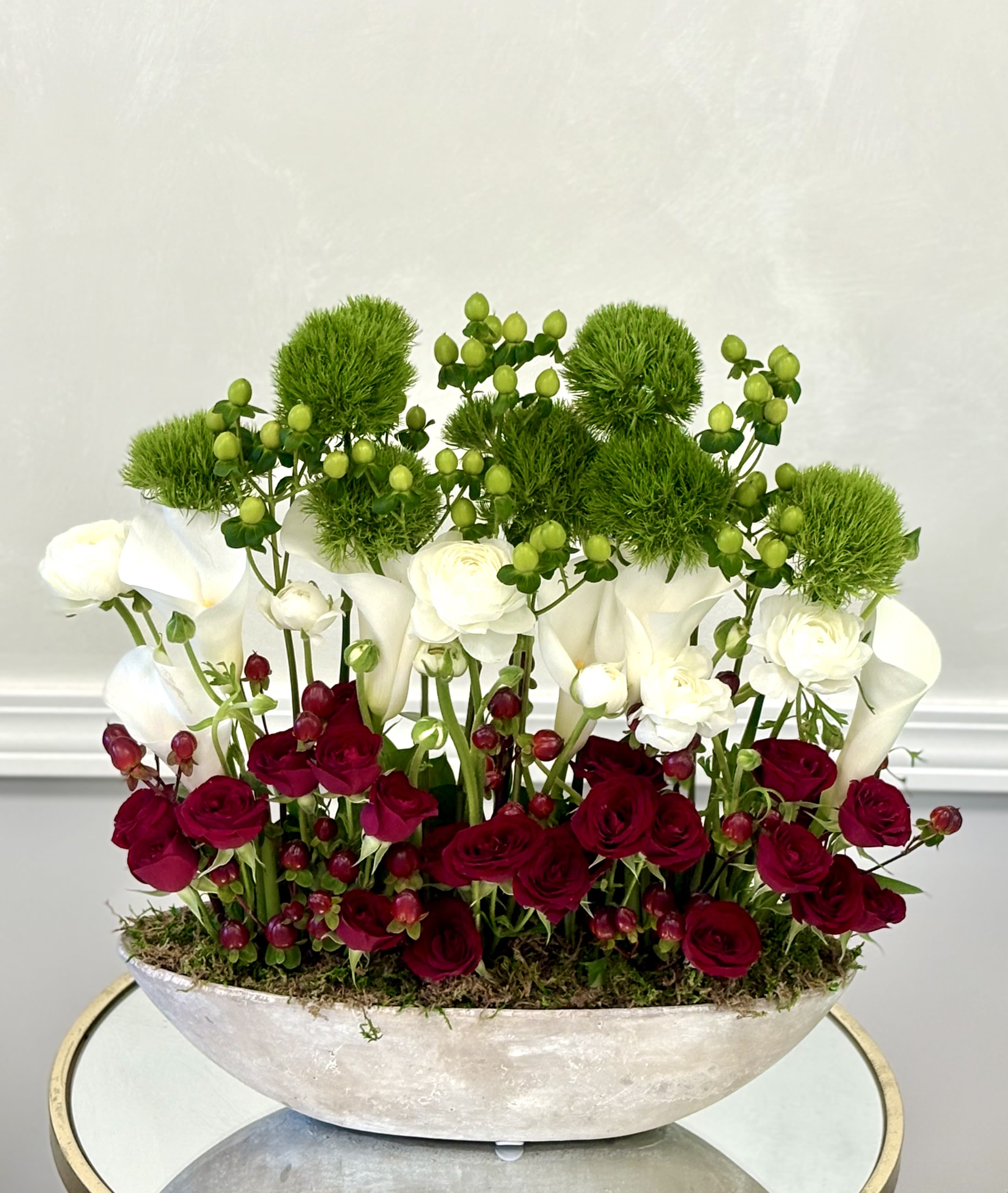 Scarlet &amp; Snow Garden By VLM Flowers - A harmonious contrast of passionate red and pure white blooms, accented with fresh green elements. This arrangement evokes timeless elegance with a modern twist, ideal for romantic occasions or upscale décor.