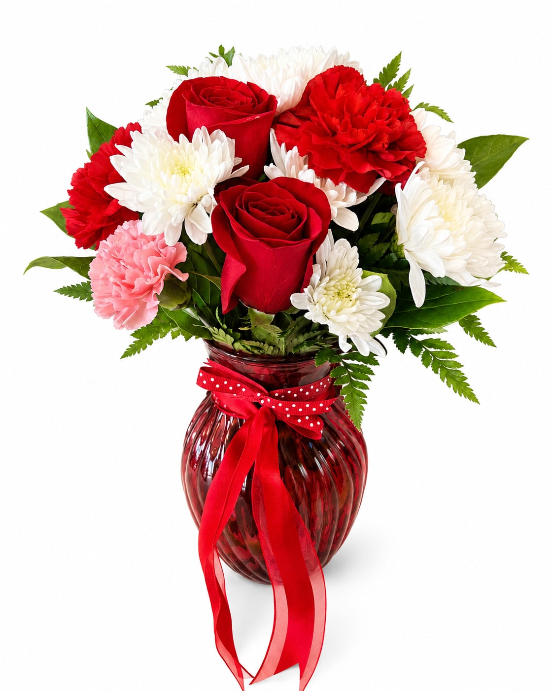 Red roses and white chrysanthemums in a red glass vase with a ribbon