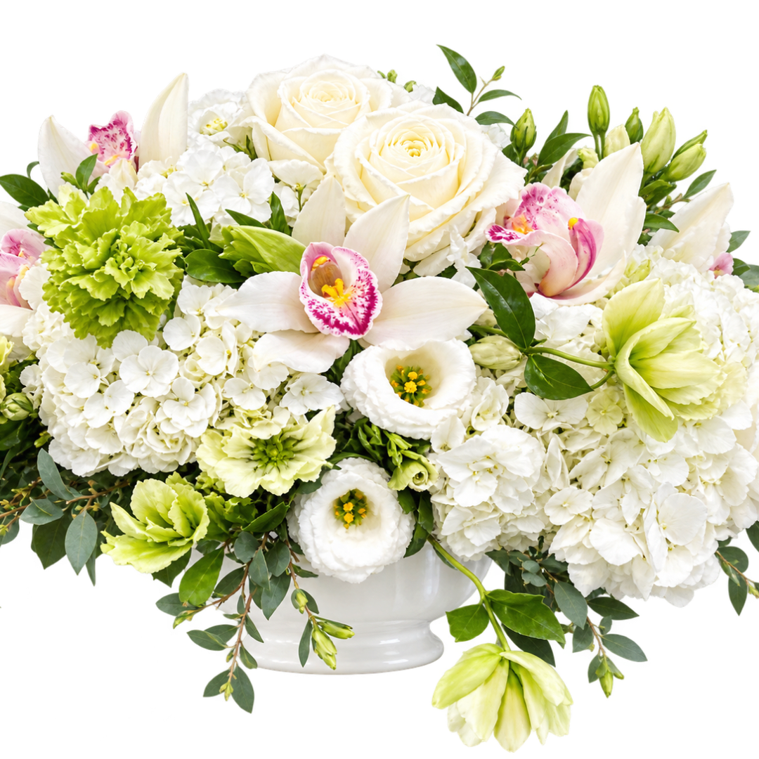 White floral arrangement with roses, lilies, and hydrangeas in a white vase