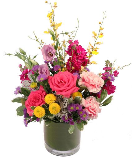 Fun Fuchsia Floral Design - These fun colors are like a flower wonderland! Bold and beautiful, Fun Fuschia is a bright and vibrant arrangement with hot pink roses, pink carnations, lavender lisanthus, yellow oncidium orchids, and more. Send this lovely bouquet to someone who deserves it!  Includes: Clear Cylinder Vase, Greens: Variegated Pittosporum, Dusty Miller, Flowers: Fuschia Stock, Lavender Lisianthus, Purple Monte Casino Asters, Bicolor Pinkwhite Carnations, Yellow Oncidium Orchids, Pink Roses.